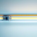 A photograph of a detailed fluorescent light fixture with visible components