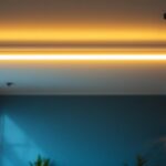 A photograph of a well-designed suspended linear lighting installation in a modern commercial space