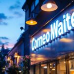 A photograph of a well-lit exterior signage installation at dusk