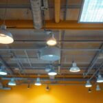 A photograph of a well-designed suspended ceiling with various lighting fixtures installed