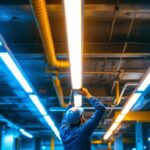 A photograph of a well-lit commercial space featuring sleek strip light fixtures in action