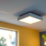 A photograph of capture a photograph of a well-lit ceiling light installation featuring a ceiling light box extension