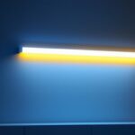 A photograph of a sleek led linear wall light installed in a modern interior setting