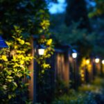A photograph of a beautifully illuminated garden fence at dusk
