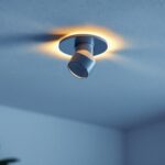 A photograph of a beautifully designed ceiling spotlight fixture installed in a modern interior space