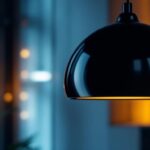 A photograph of a stylish black round pendant light hanging elegantly in a modern interior setting