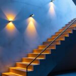 A photograph of a beautifully designed stairwell featuring stylish wall lighting fixtures that enhance the ambiance