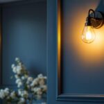 A photograph of a beautifully designed wall sconce lighting fixture installed in an elegantly styled interior space