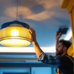 A photograph of a beautifully designed ceiling lamp in a stylish interior setting