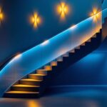 A photograph of a beautifully designed interior staircase illuminated by stylish lighting fixtures